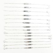 COLLECTION OF SILVER CHILDREN'S IDENTITY BRACELETS