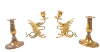 TWO PAIRS OF BRASS CANDLESTICKS - ONE WITH PHOENIX FIGURES