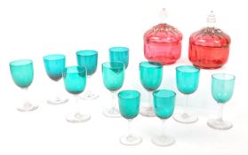 COLLECTION OF ELEVEN STEMMED STEM GLASSES W/ CRANBERRY POTS