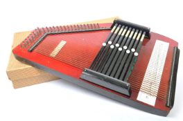 20TH CENTURY NINE CHORD BAR AUTOHARP IN RED AND BLACK