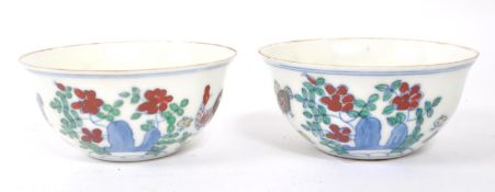 PAIR OF EARLY 20TH CENTURY HAND PAINTED CHINESE TEA BOWLS