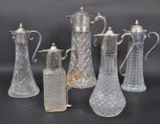 COLLECTION OF SILVER PLATE CUT CRYSTAL GLASS JUGS