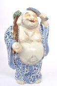 JAPANESE KUTANI PORCELAIN FIGURE OF HOTEI BUDDHA