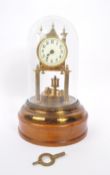 EARLY 20TH CENTURY ANNIVERSARY BRASS CLOCK WITH GLASS DOME