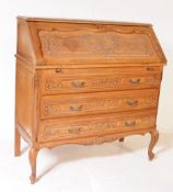 CONTINENTAL FRENCH GOLDEN OAK CARVED BUREAU DESK