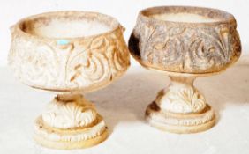TWO 20TH CENTURY COMPOSITE STONE PLANTERS