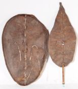 TWO 20TH CENTURY ZULU AFRICAN COWHIDE WAR SHIELDS