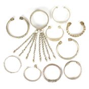 COLLECTION OF INDIAN WHITE METAL KADA BRACELETS
