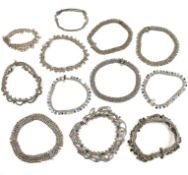LARGE COLLECTION OF INDIAN SILVER & WHITE TONE METAL ANKLETS