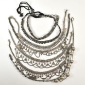 COLLECTION OF INDIAN WHITE TONE METAL NECKLACES & CHOKERS
