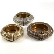 THREE OMANI METAL BANGLES CONVERTED INTO TRINKET DISHES