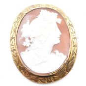 YELLOW METAL FRAMED CARVED CAMEO BROOCH PIN