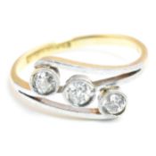 18CT GOLD & PLATINUM DIAMOND THREE STONE CROSSOVER RING
