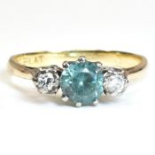 18CT GOLD ZIRCON & DIAMOND THREE STONE RING