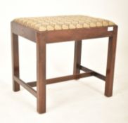 GEORGE III MAHOGANY UPHOLSTERED PIANO FOOT STOOL