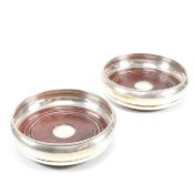 PAIR OF HALLMARKED SILVER & MAHOGANY LINED WINE COASTERS