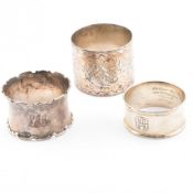 THREE EARLY 20TH CENTURY SILVER NAPKIN RINGS