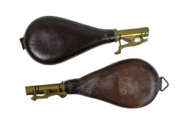 TWO EARLY 20TH CENTURY LEATHER POWDER FLAKS