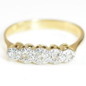 18CT GOLD ILLUSION SET DIAMOND FIVE STONE RING
