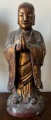 QING DYNASTY FIGURINE OF A STANDING MONK 清仿明和尚立像