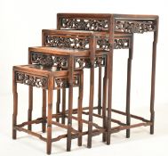 NEST OF FOUR CHINESE HARDWOOD TABLES 一套四件木雕刻巢桌