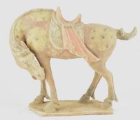 TANG DYNASTY PAINTED POTTERY FIGURE OF A HORSE 唐 陶加彩马