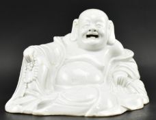 QING DEHUA BLANC DE CHINE SEATED BUDAI 清 德化布袋和尚坐像