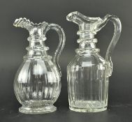 TWO GEORGE IV CUT GLASS CLARET JUGS, EACH WITH THREE RINGS