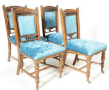 FOUR EARLY 20TH CENTURY CARVED OAK DINING CHAIRS