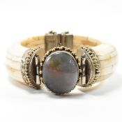 VINTAGE INDIAN WHITE METAL MOUNTED BONE CUFF BRACELET