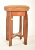 VINTAGE ART DECO LEATHER AND OAK STOOL