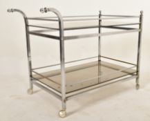 RETRO MID CENTURY ITALIAN SMOKED GLASS AND CHROME TROLLEY