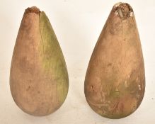 TWO VINTAGE MID CENTURY WEIGHTED COCONUT SHY COCONUTS