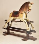VINTAGE MID CENTURY ROCKING HORSE ON MAHOGANY MOUNT