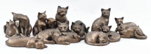 PAUL JENKINS - COLLECTION OF NINE BRONZED FRITH CAT FIGURINES