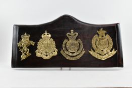 ROYAL HONG KONG POLICE BRASS PLAQUES MOUNTED ON WOOD