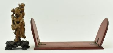 TWO CHINESE WOODEN PIECES - FIGURE OF A MAN AND A BOOK HOLDER