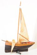 EARLY 20TH CENTURY HAND GROOVED PAINTED SHIP MODEL