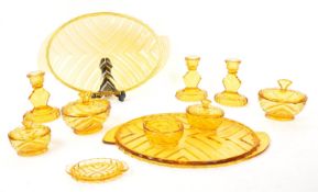 TWO MID CENTURY ART DECO AMBER GLASS DRESSING TABLE SET