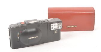 OLYMPUS XA 35MM RANGEFINDER & ACCESORIES