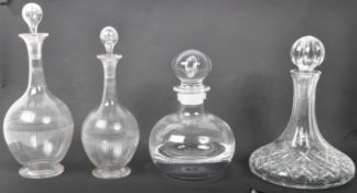 COLLECTION OF FOUR GLASS STOPPERED DECANTERS