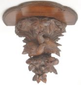 BLACK FOREST MID CENTURY CARVED WALL SCONCE