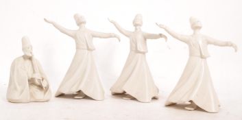 COLLECTION OF FOUR YILDIZ PORCELAIN SUFI DANCERS