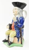18TH TO EARLY 19TH CENTURY STAFFORDSHIRE WILLIAM KENT TOBY JUG