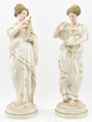 PAIR OF BELIEVED ROYAL WORCESTER PAINTED BISQUE FEMALE FIGURES