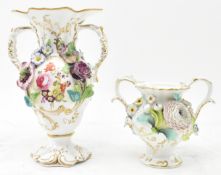 TWO BELIEVED COALPORT BONE CHINA FLORAL HANDLED VASES