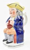 BELIEVED EARLY 19TH CENTURY STAFFORDSHIRE POTTERY TOBY JUG