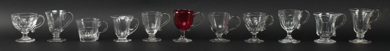 ELEVEN LATE GEORGE III EARLY VICTORIAN GLASS CUSTARD CUPS