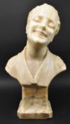 LARGE 19TH CENTURY CARVED ALABASTER BUST OF LAUGHING BOY