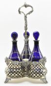 VICTORIAN BRISTOL BLUE GLASS DECANTER IN WHITE METAL STAND